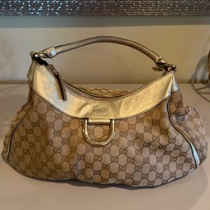Authentic Gold Gucci bag